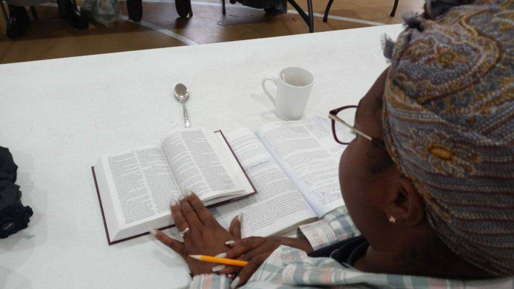 Woman looking at bible
